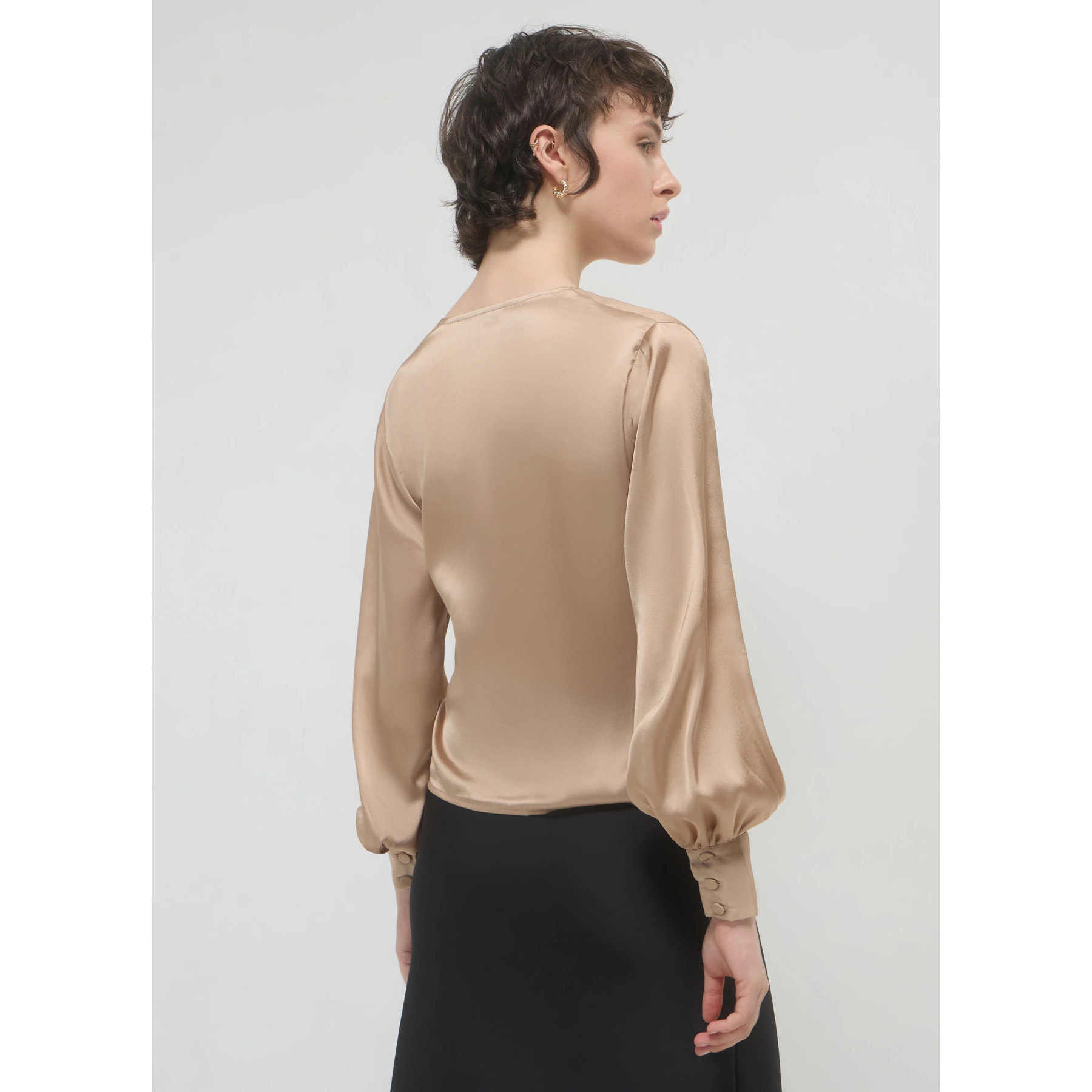 Blusa incrociata con fusciacca