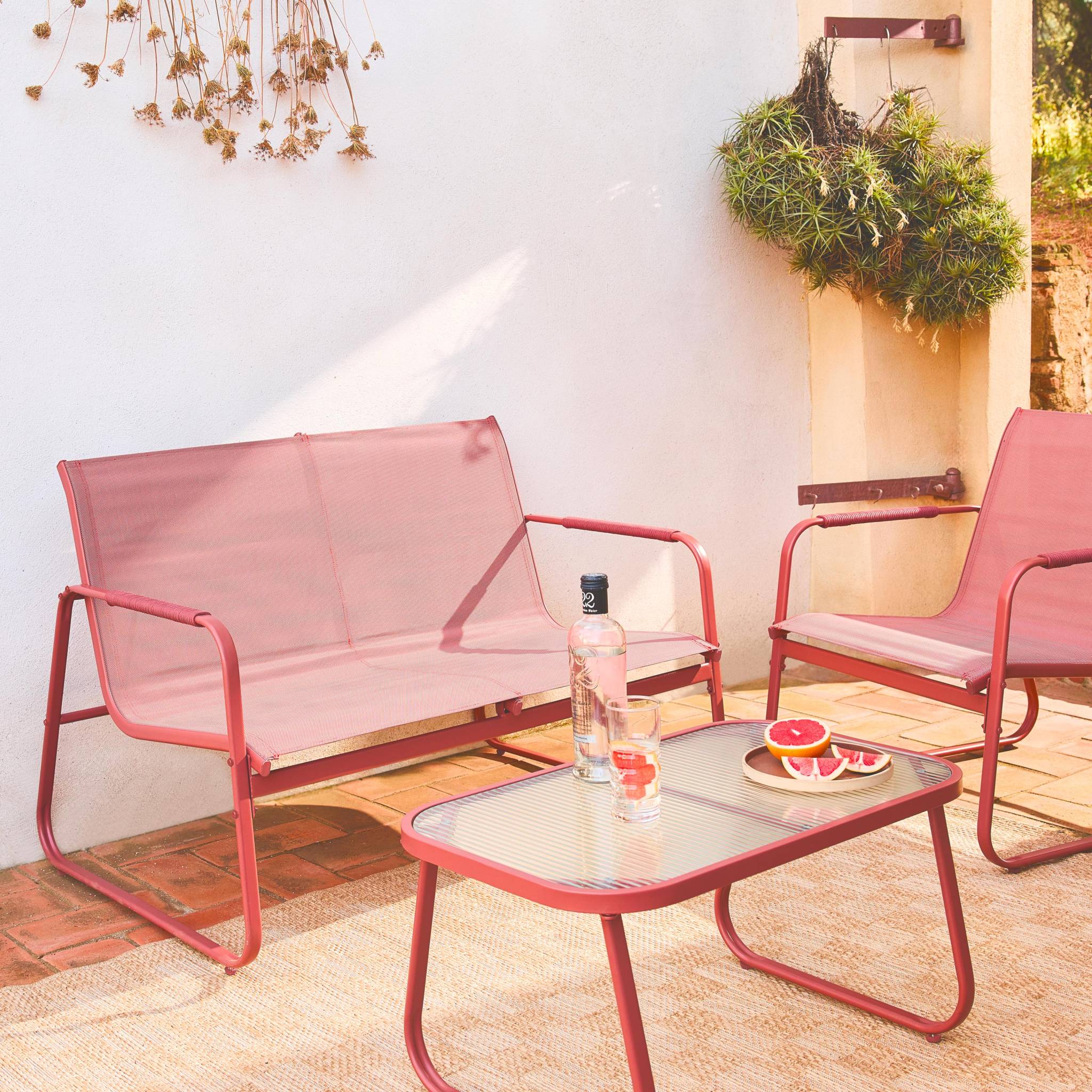 Salon de jardin terracotta NOTO acier. 4 places. un canapé. une table. deux fauteuils textilene
