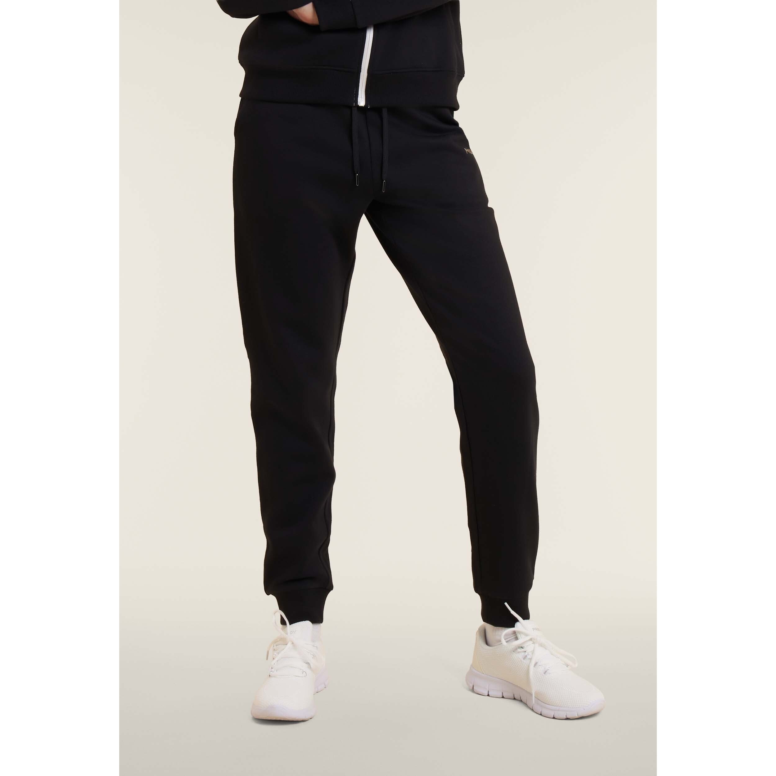 Tuta con zip e collo alto decorata da inserti animalier