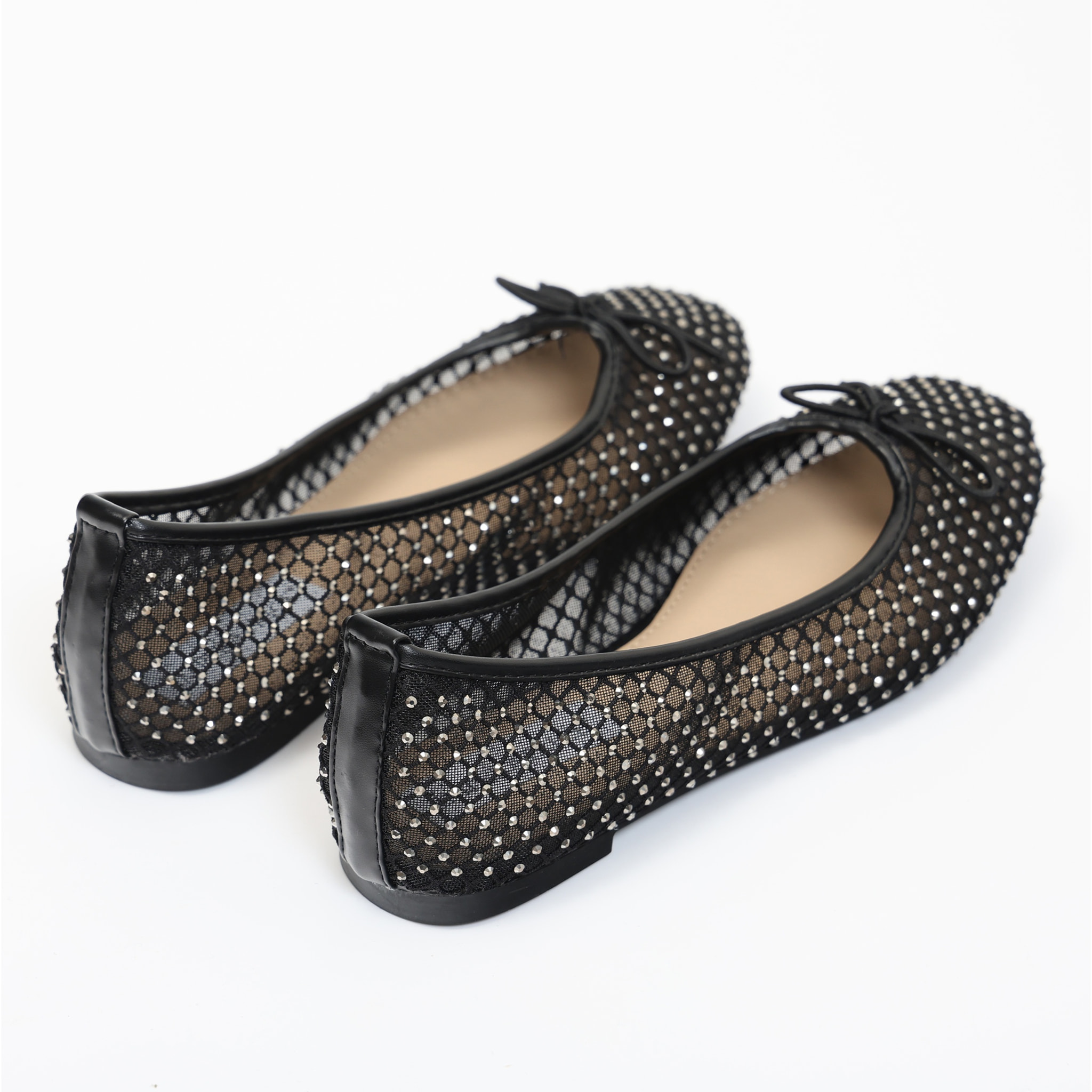 Ballerine in simil pelle traforate con strass