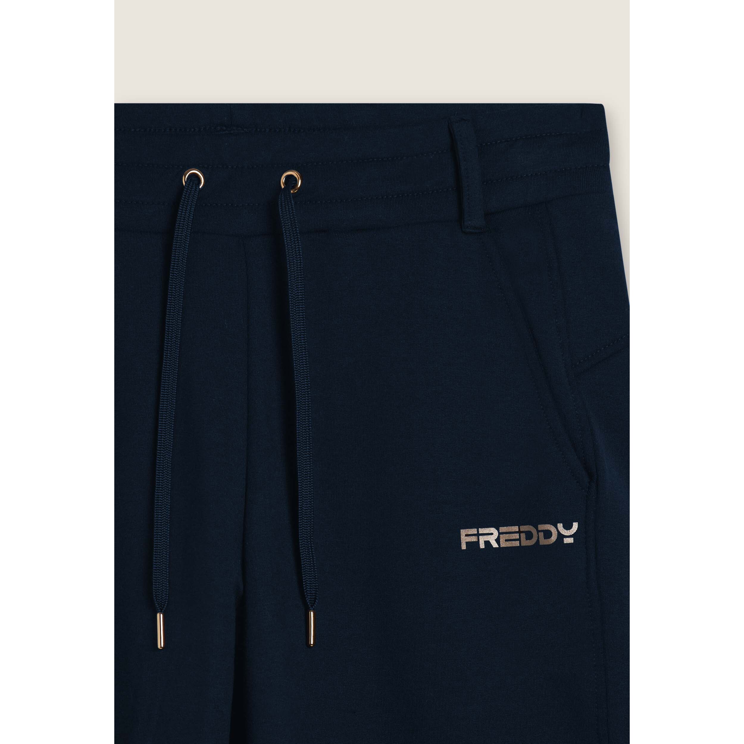 Pantaloni slim fit con spacchi laterali