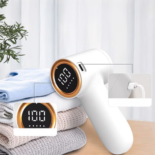 Quitapelusas compacto para el hogar, con batería incorporada, pantalla LED con indicación de batería y 5 niveles de potencia. Incluye 2 cabezales de repuesto.