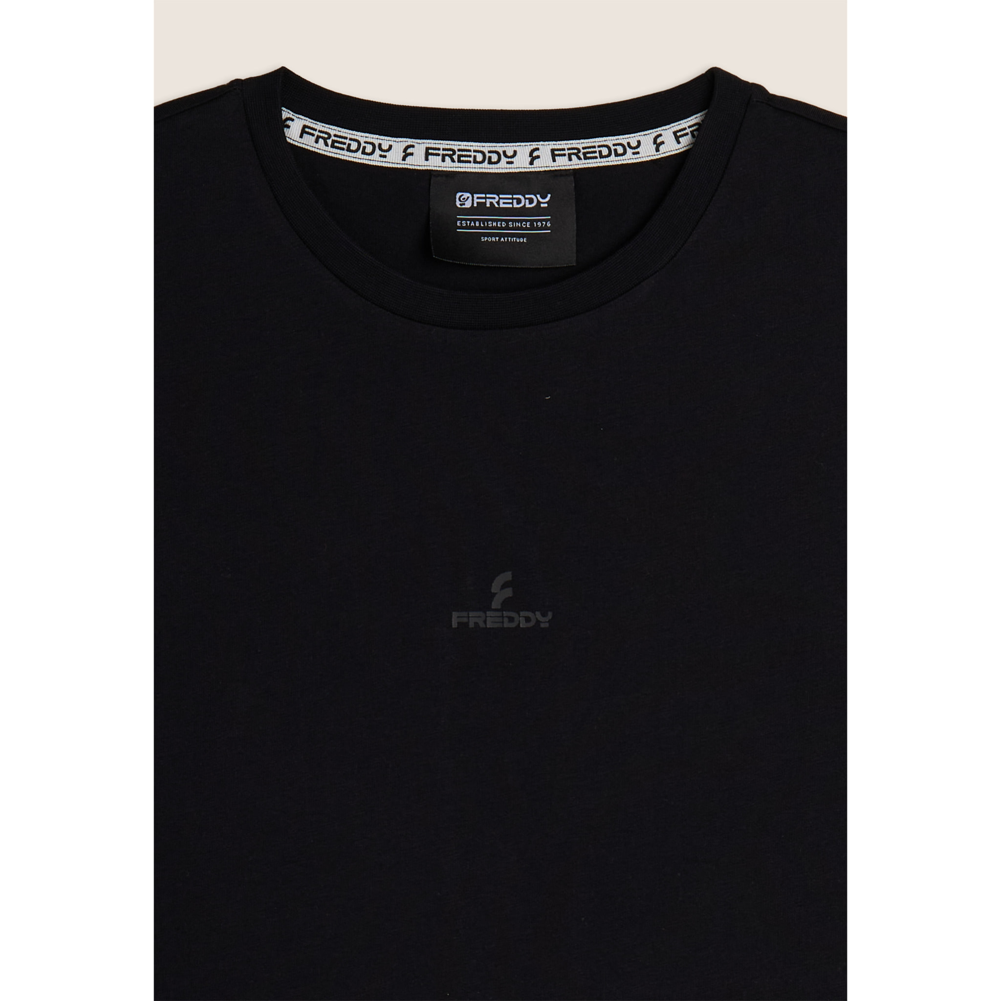 Completo sportivo in cotone con top smanicato e bermuda