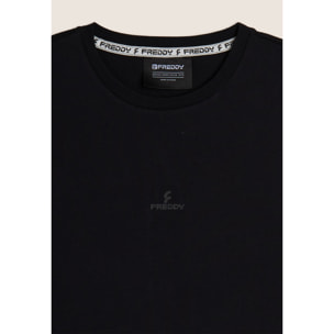 Completo sportivo in cotone con top smanicato e bermuda