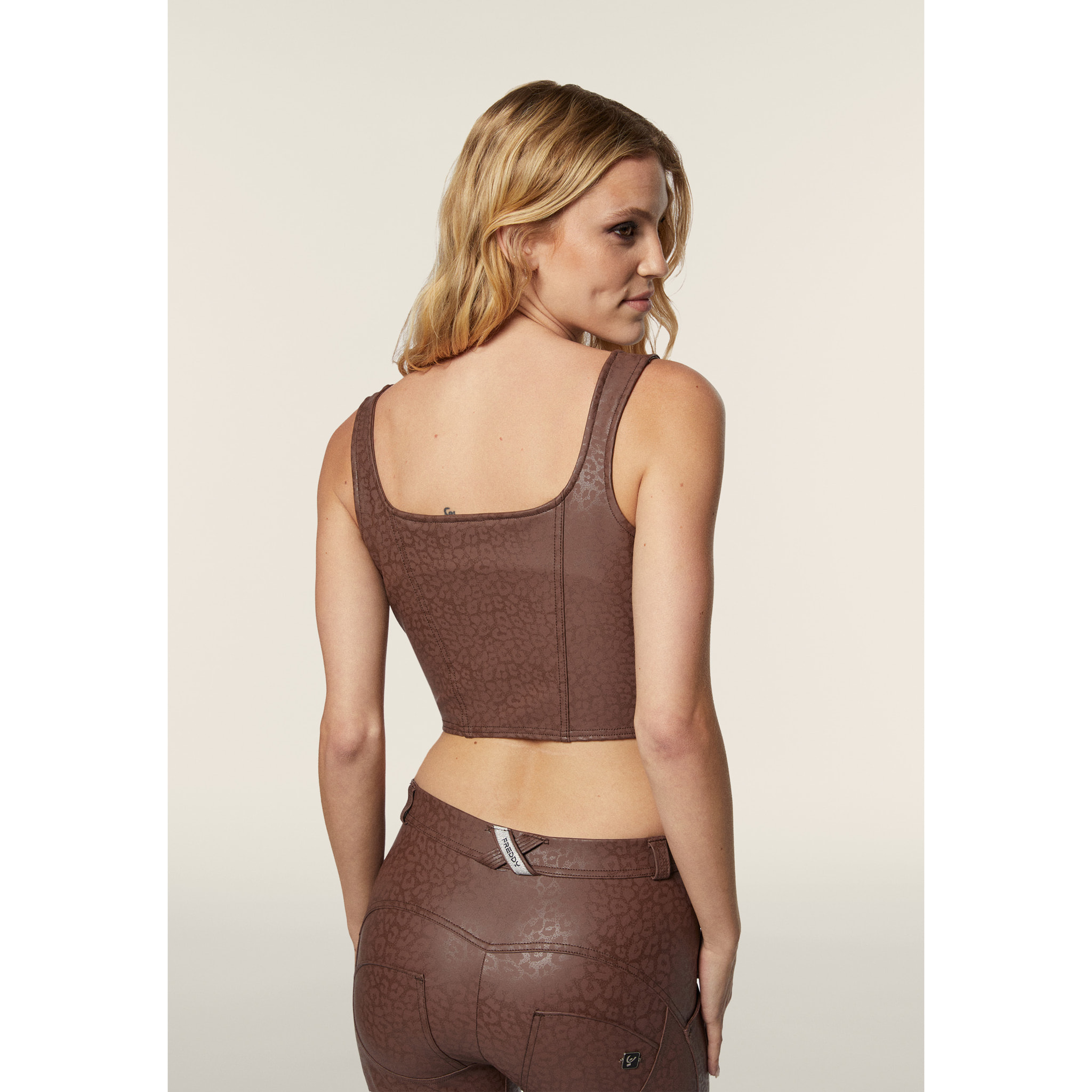 Top corto a bustier in similpelle stampa animalier lucida