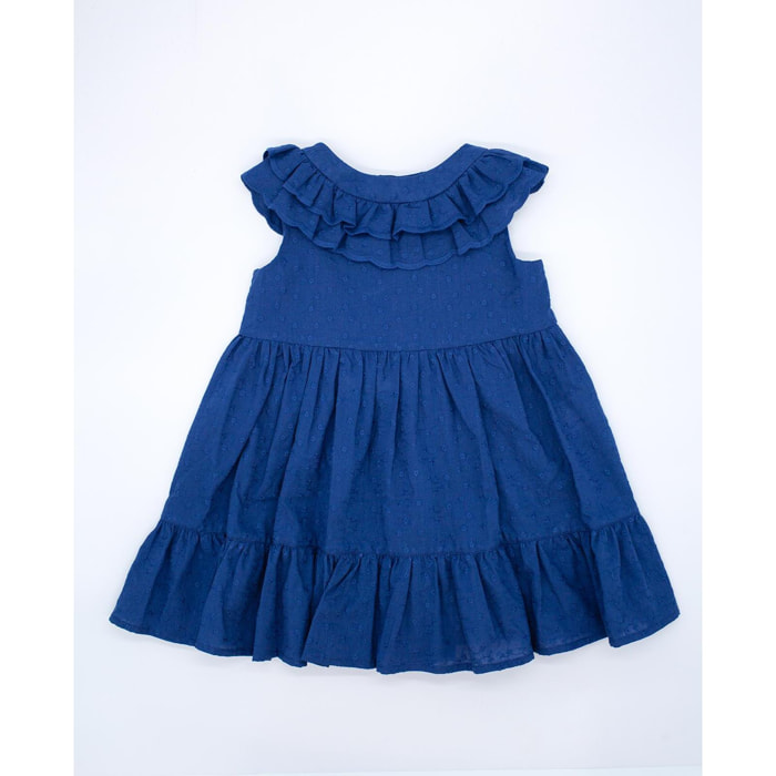 Vestido de voile bordado azul marino. De tirantes con doble volante en el cuello, falda fruncida con volante.