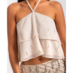 Top de mujer de gasa con volantes y cuello halter ajustable.