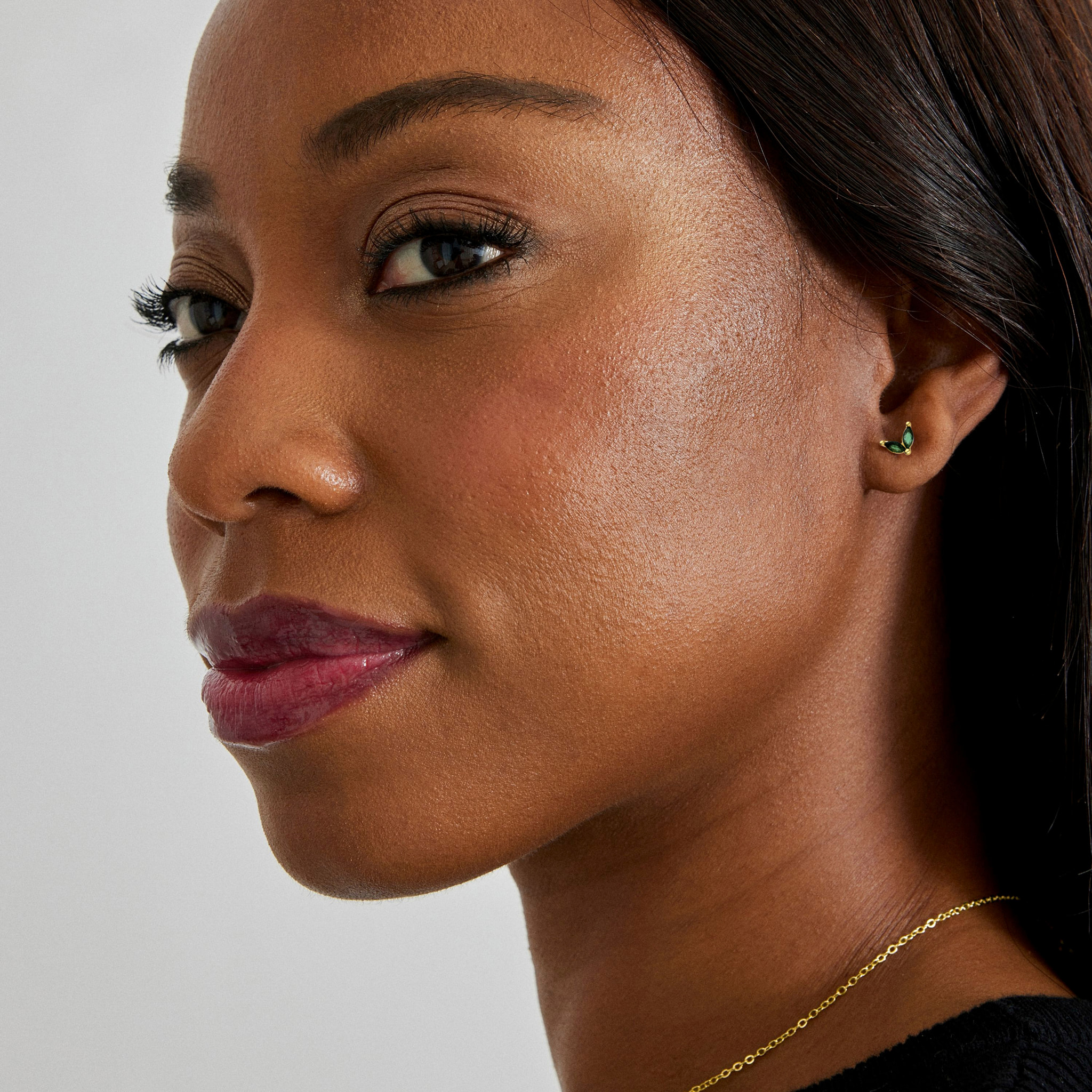 Pendientes de Circonita Esmeralda acabados en oro amarillo de 18K