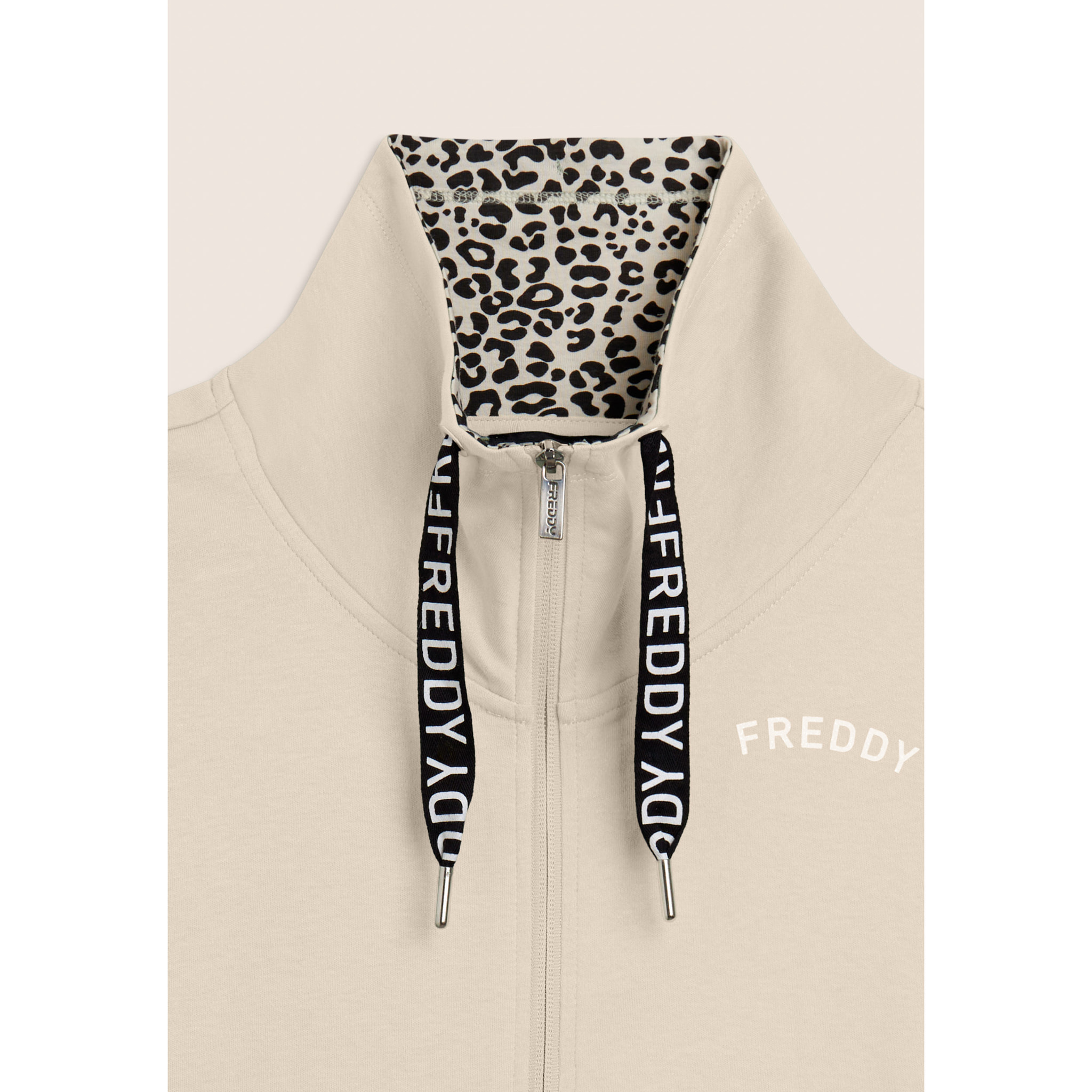 Tuta con zip e collo alto con interno animalier