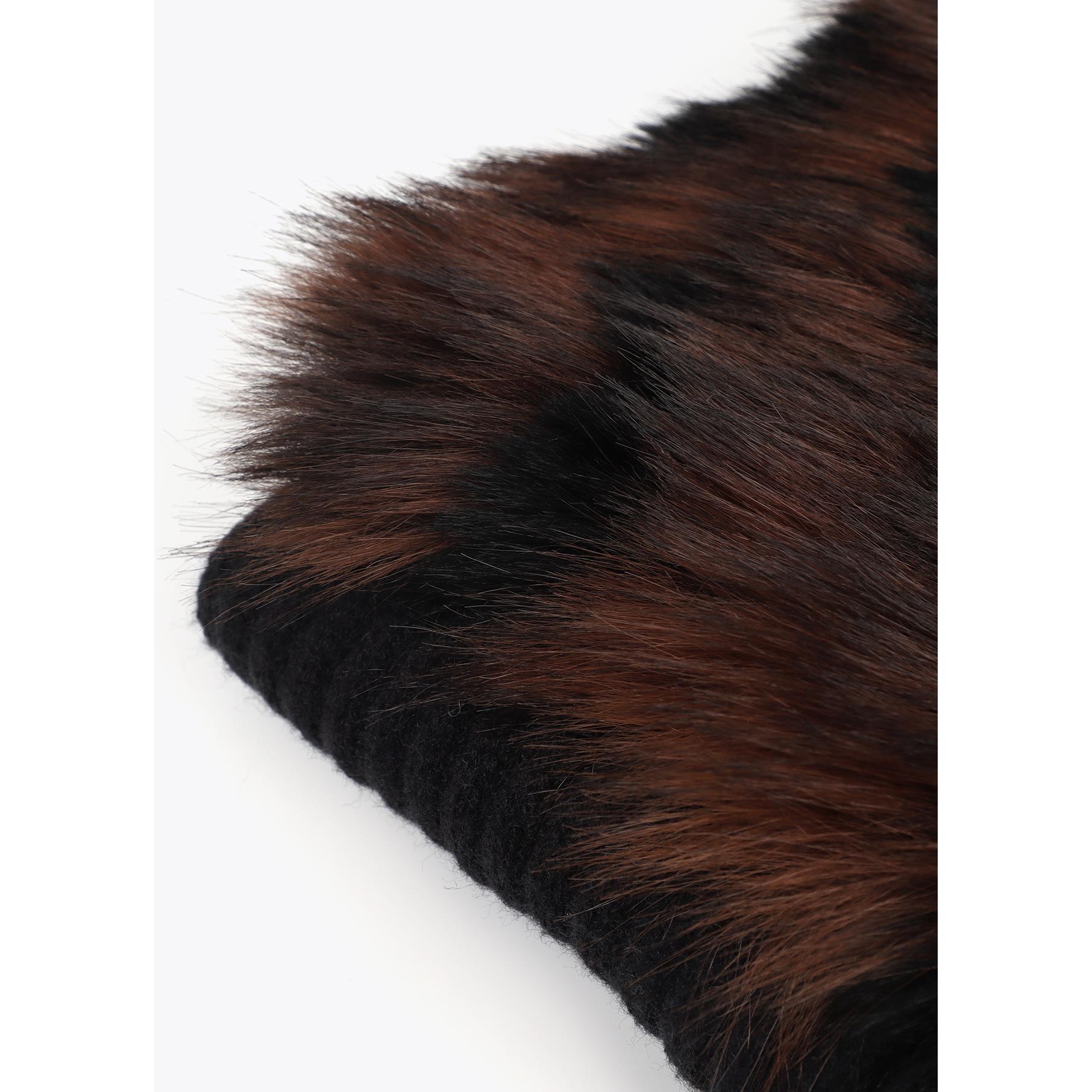 Sciarpa combinata in maglia e pelliccia sintetica