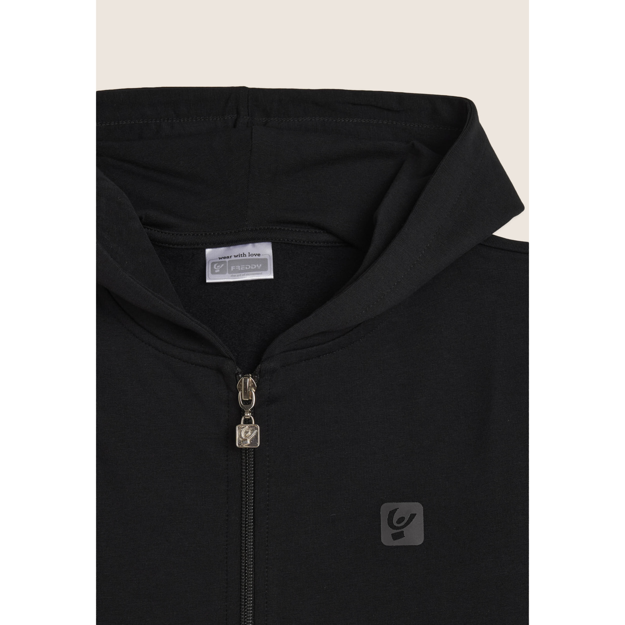 Tuta Junior full-zip con cappuccio e tasche a marsupio