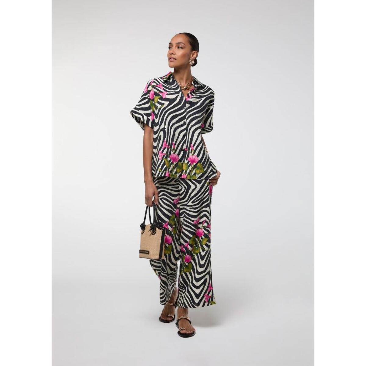 Pantaloni con stampa zebra e fiori