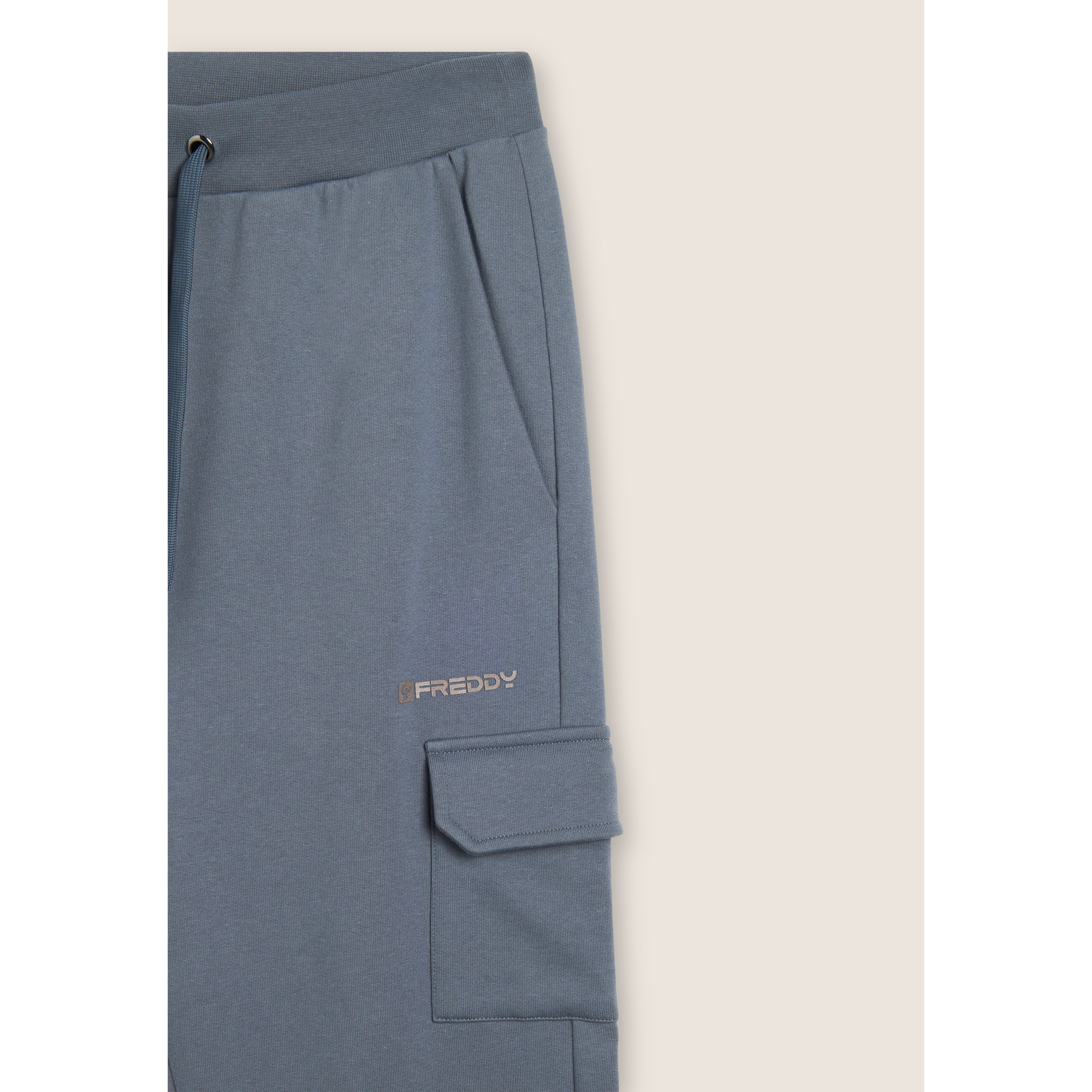 Pantaloni in felpa con tasca cargo e fondo a polsino