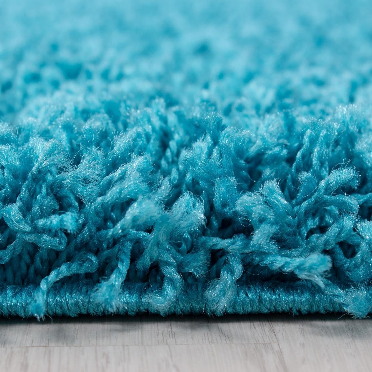 Tapis poils longs shaggy tissé motif uni ROCA