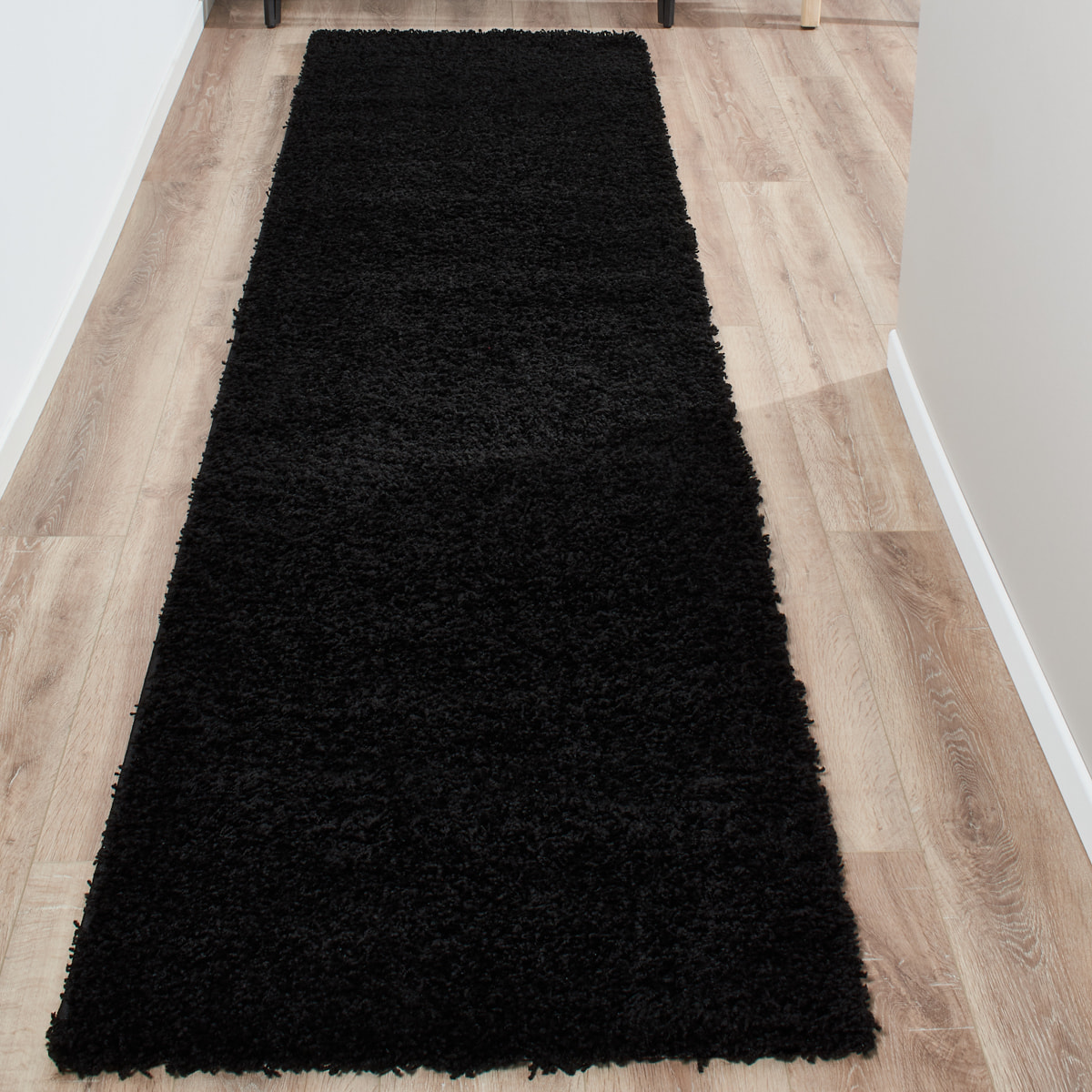 Uni - tapis de salon en laine artificielle noir