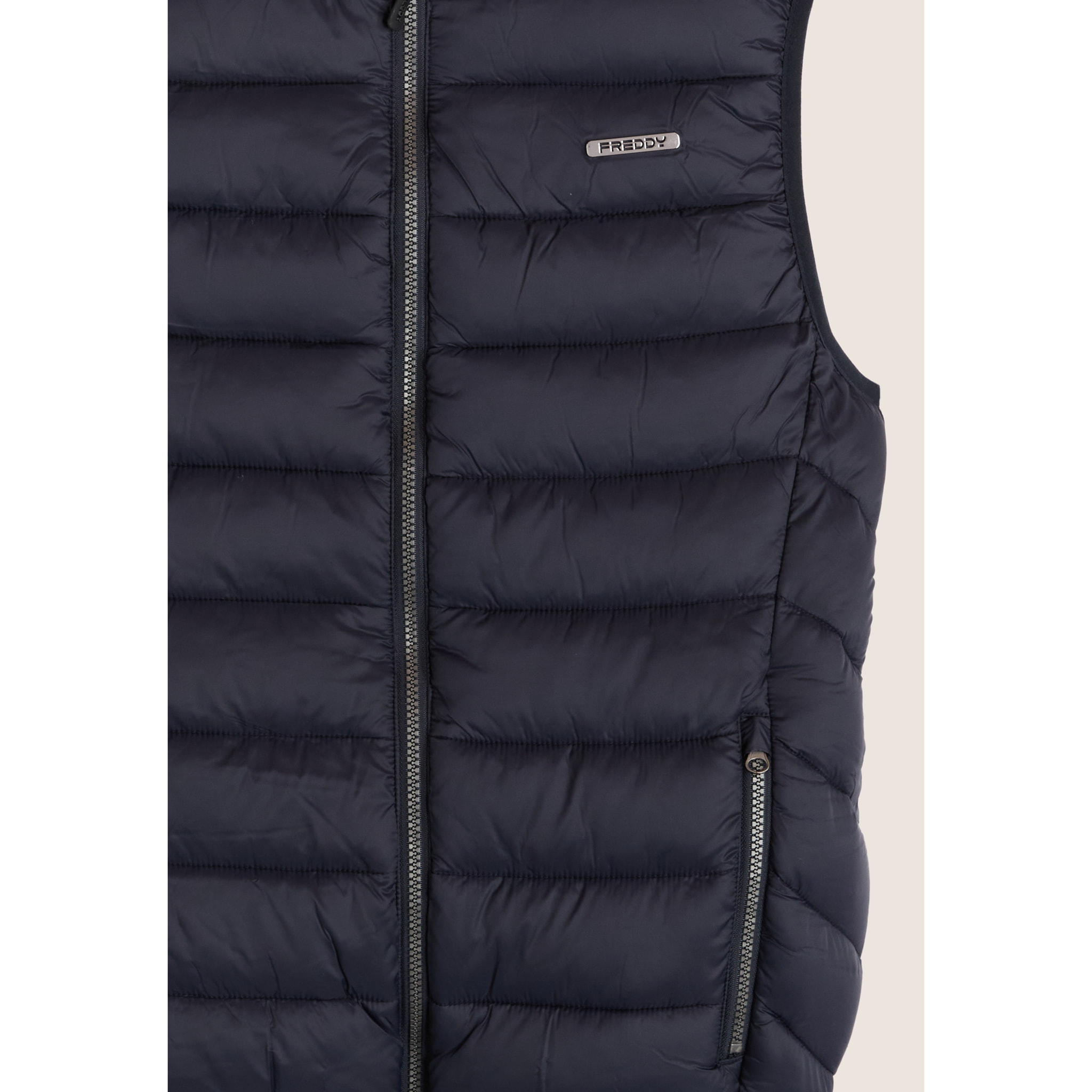 Gilet trapuntato con collo alto e zip doppio cursore