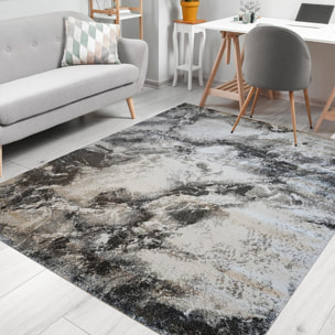 tapis moderne gris et taupe aux motifs abstraits