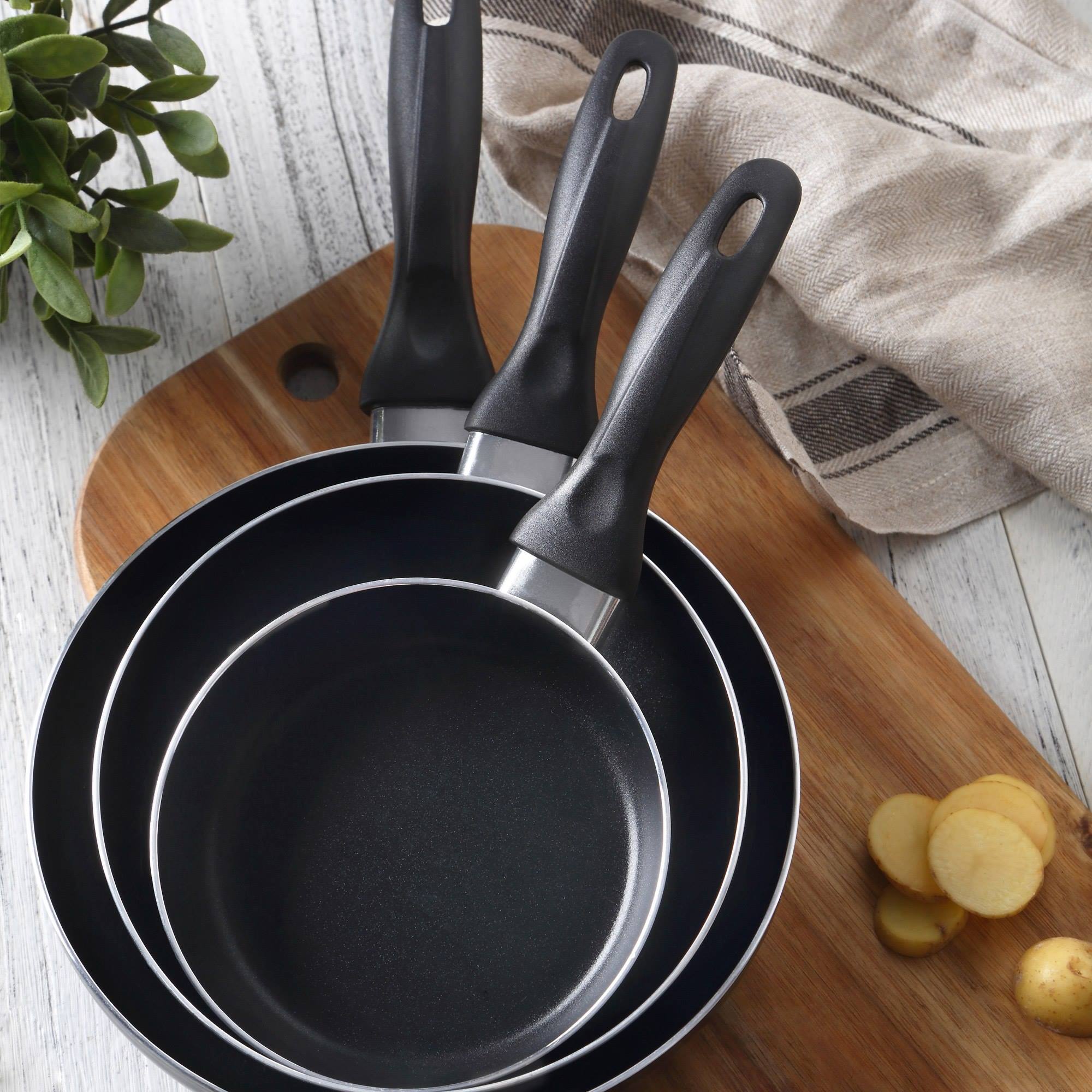 set de batería de cocina de 7pc en acero inoxidable + 3 sartenes ø16ø20ø24cm negro en aluminio prensado