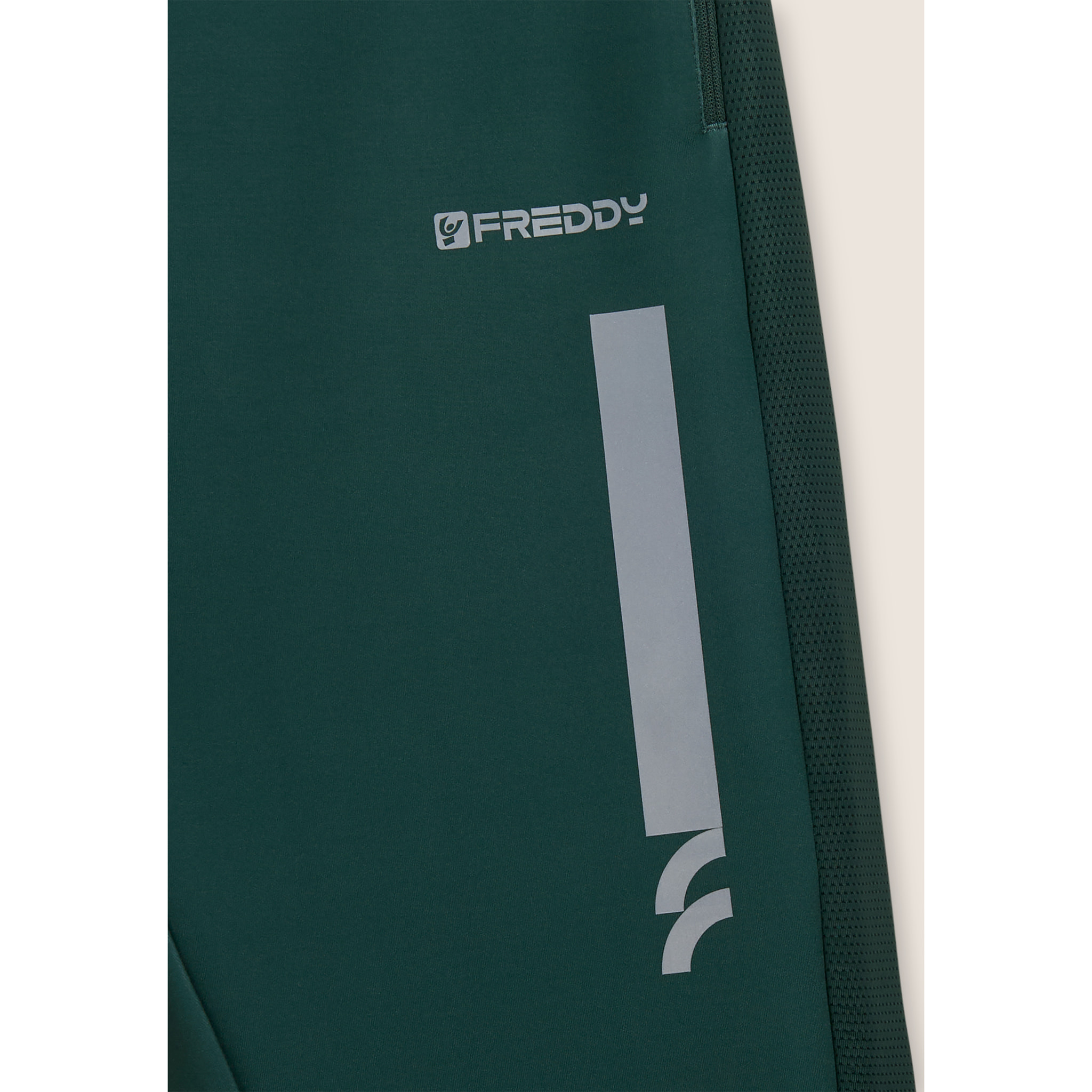 Pantaloni slim in tessuto tecnico con inserti mesh laterali