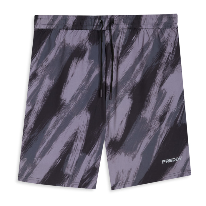 Shorts stampati con coulisse e tasche zip