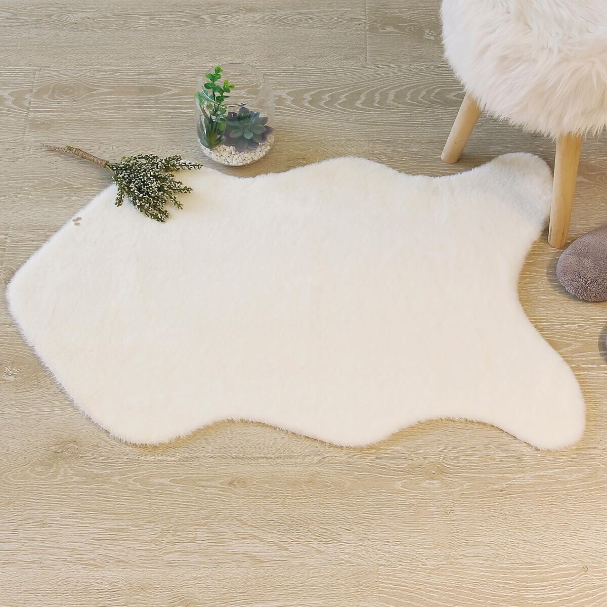 Tapis "Couka" effet fourrure blanc ivoire 60x90cm