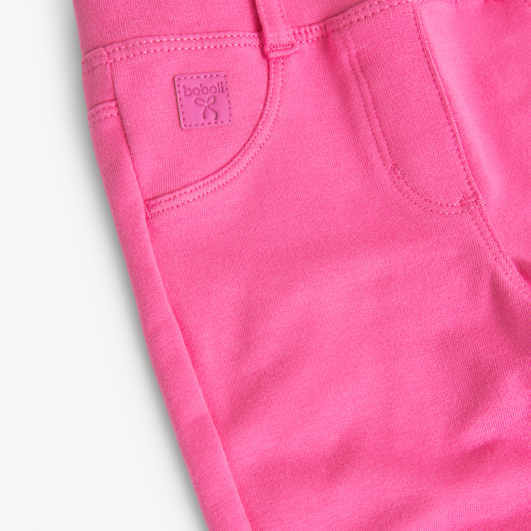 PantalÃ³n elÃ¡stico para niÃ±a en felpa lisa, color rosa