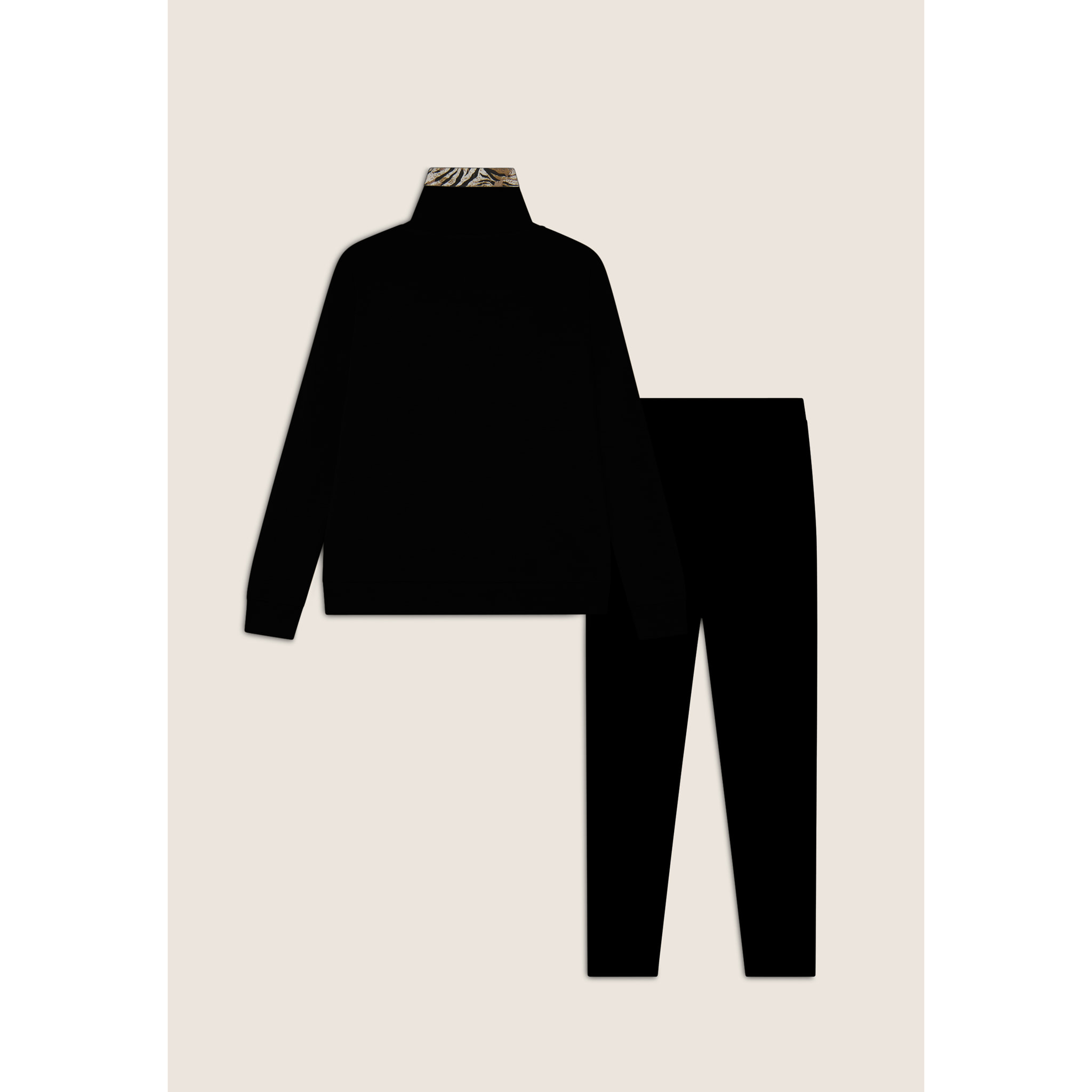 Tuta interlock con zip e collo alto interno fantasia