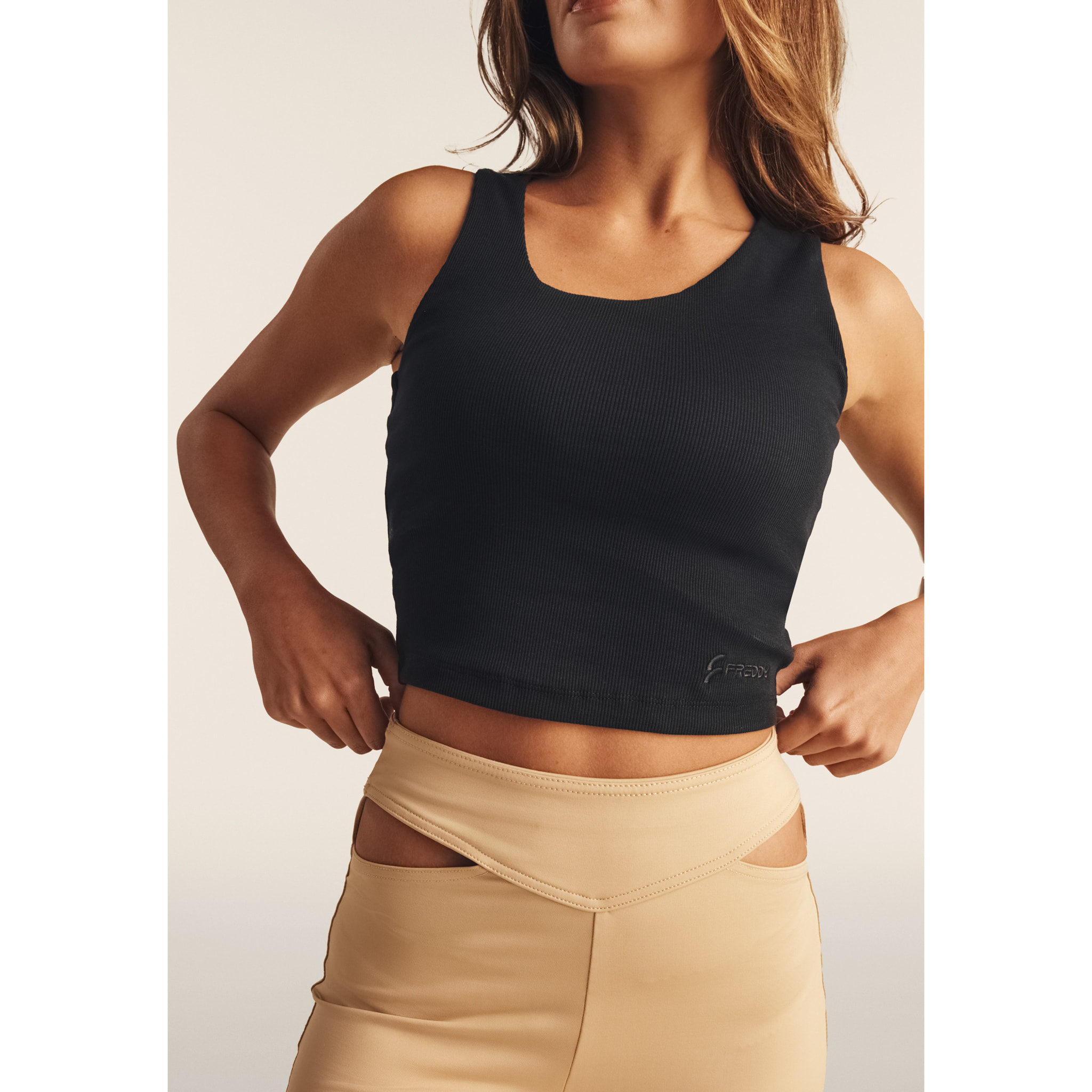 Pantaloni N.O.W. traspiranti vita alta e dettagli cut out