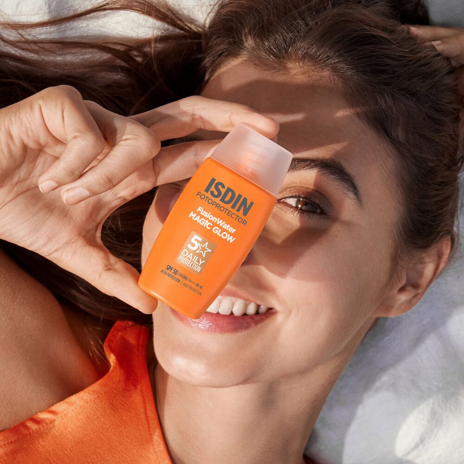 Fusion Water Magic Glow - Protection solaire visage SPF 50