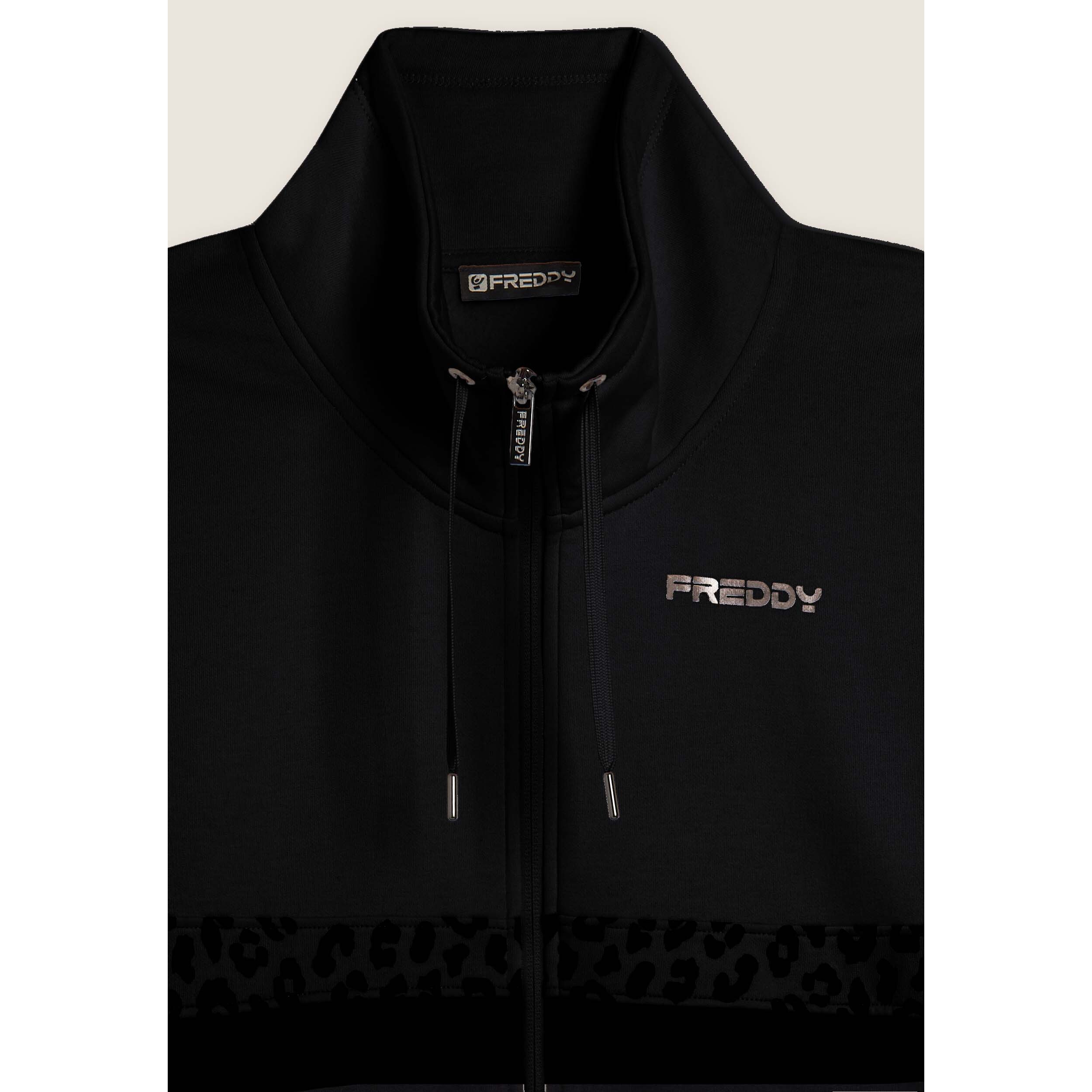 Tuta con zip e collo alto decorata da inserti animalier