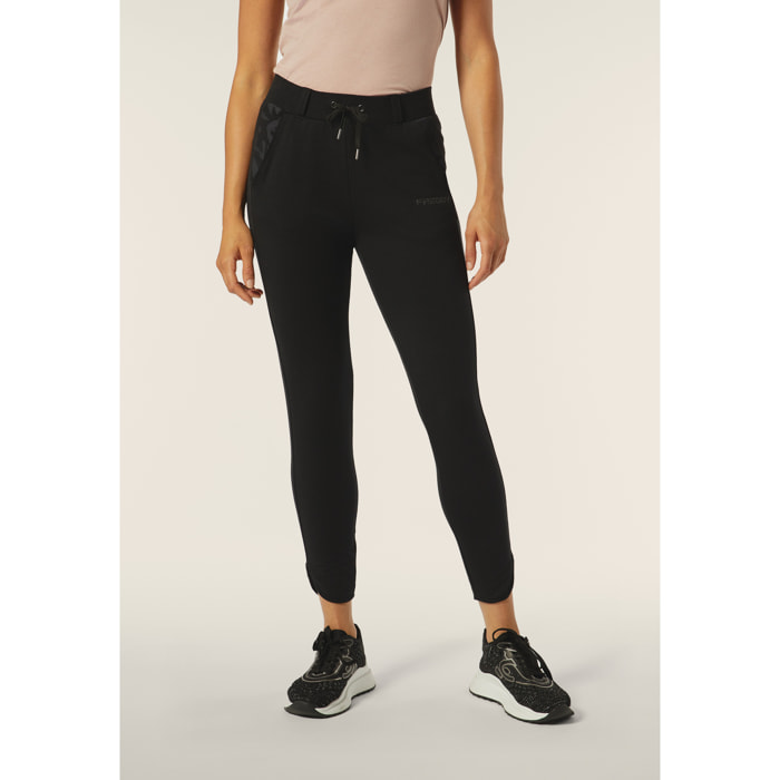 Pantaloni donna slim fit in felpa con apertura sul fondo