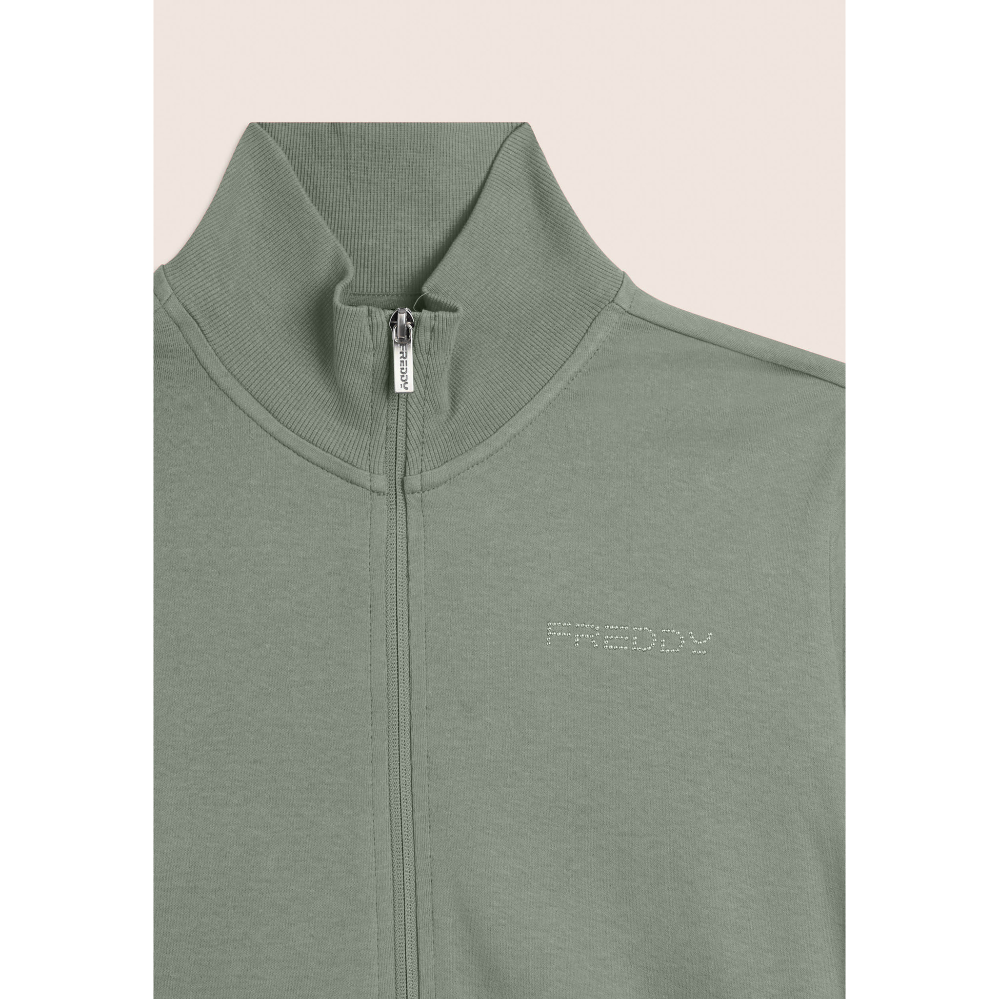 Tuta con zip e collo alto, logo in perline