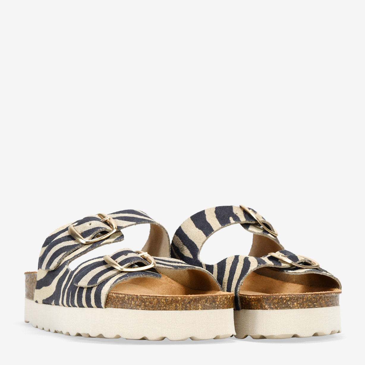 Sandalias de piel cebra con hebillas