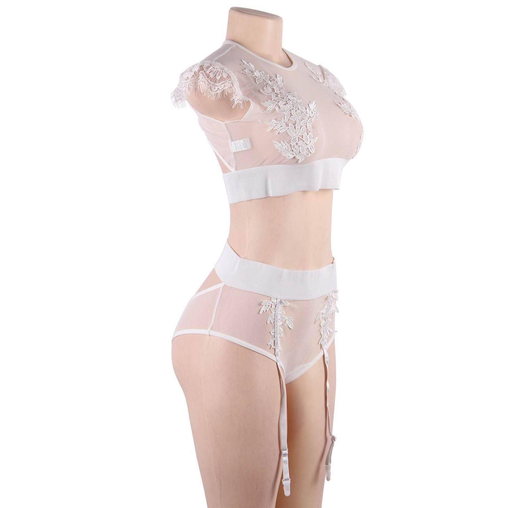 Conjunto blanco de lencería con transparencias y liga