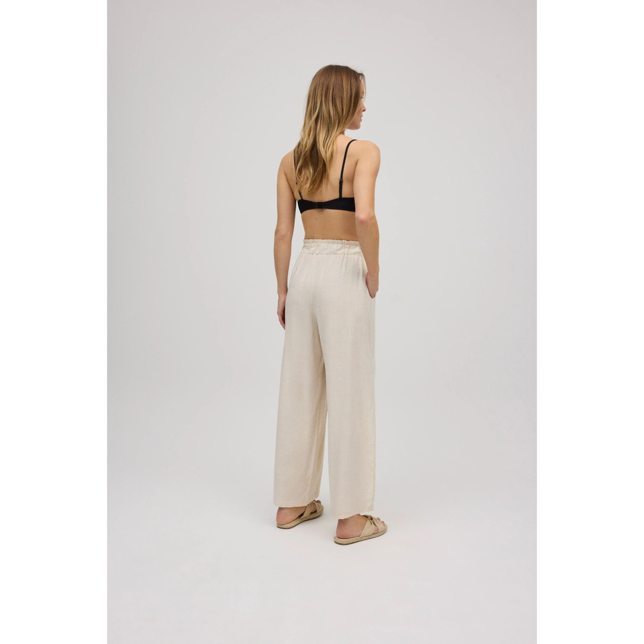 Pantaloni in lino a gamba larga con apertura