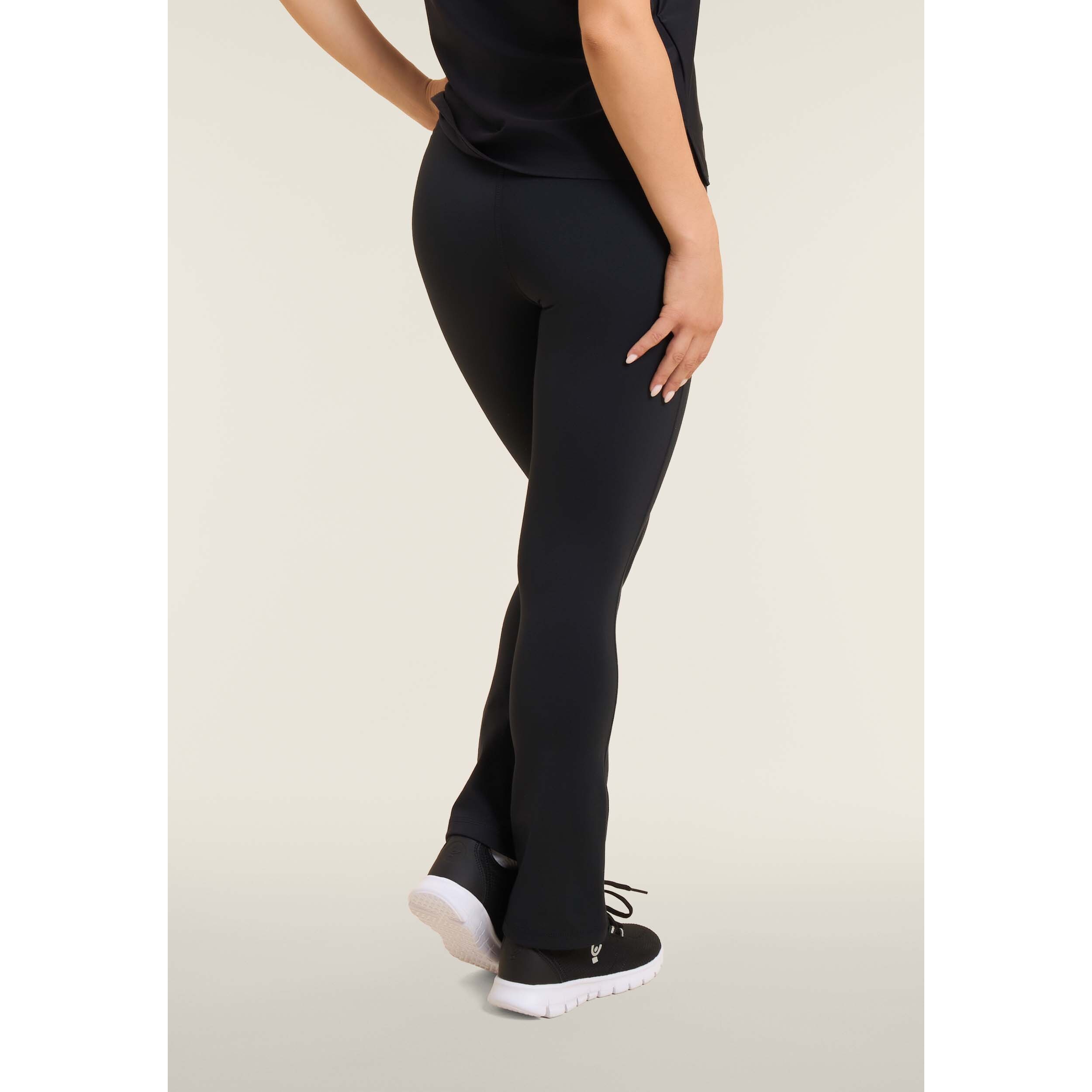 Leggings in tessuto tecnico svasati con fascia in silicone