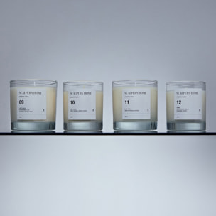 Set de 4 velas aromáticas de 300gr con aromas de light green, white lotus, light peach y stone scalpers