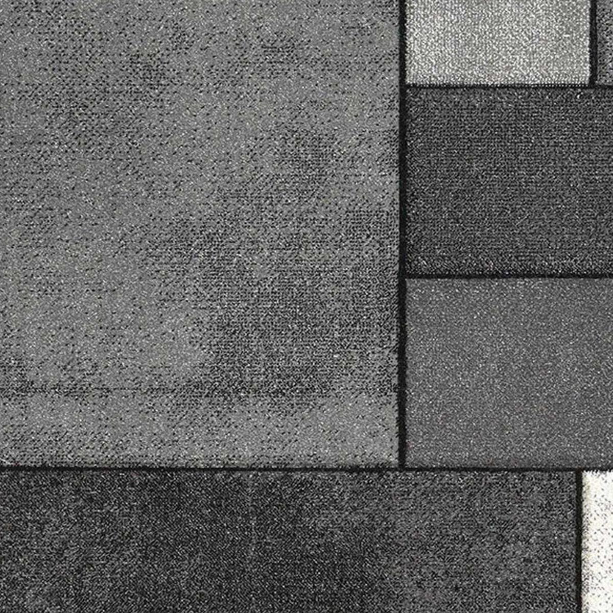 Tapis Tuho aux couleurs grises et aux motifs géométriques