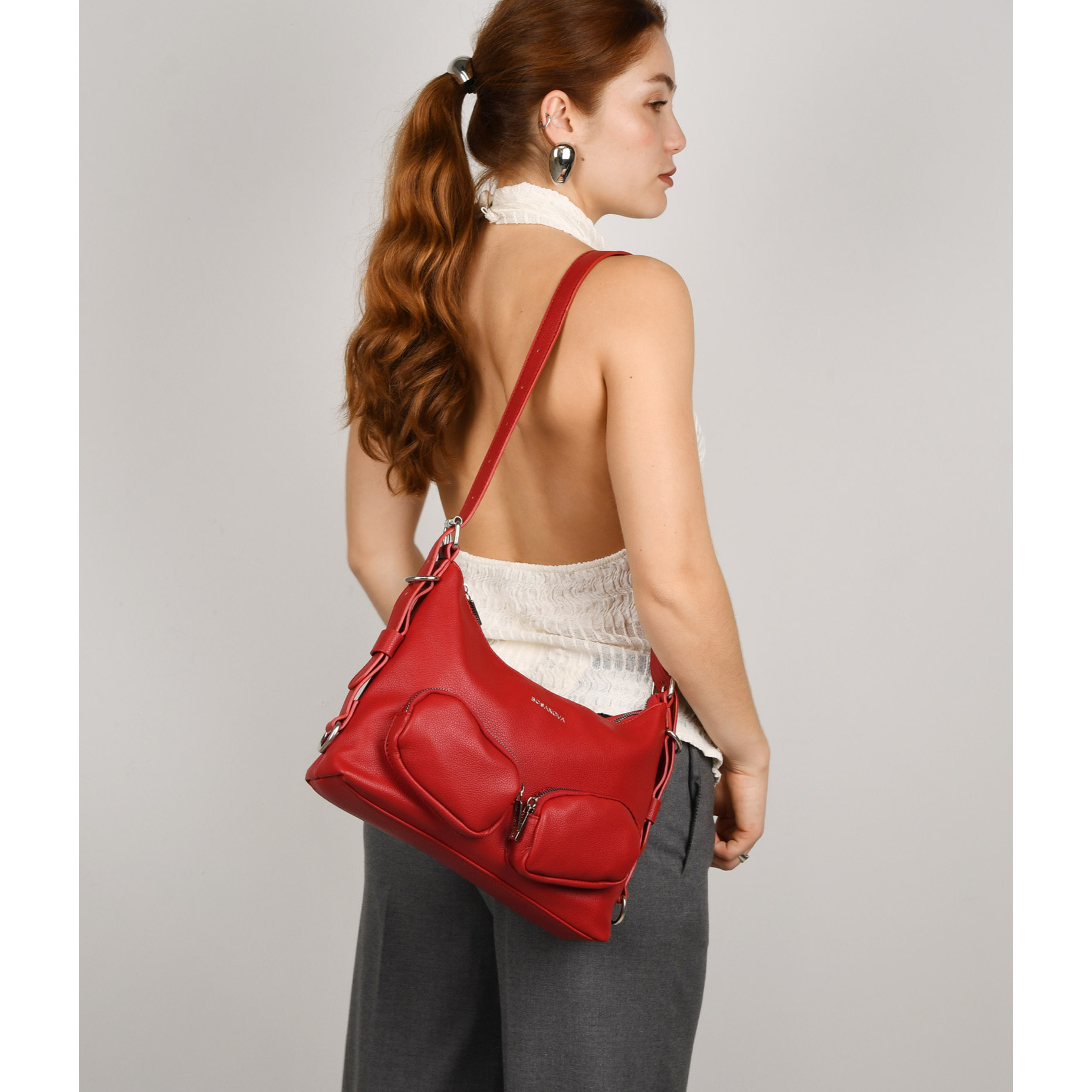 Bolso de hombro rojo con bolsillos