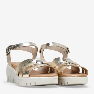 Sandalias de cuña doradas en piel