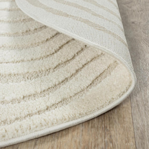 Tapis rond tendance ton sur ton aux motifs simples et à la forme originale