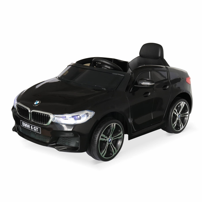 BMW Série 6 GT noire. voiture électrique pour enfants 12V 4 Ah. 1 place. avec autoradio et télécommande