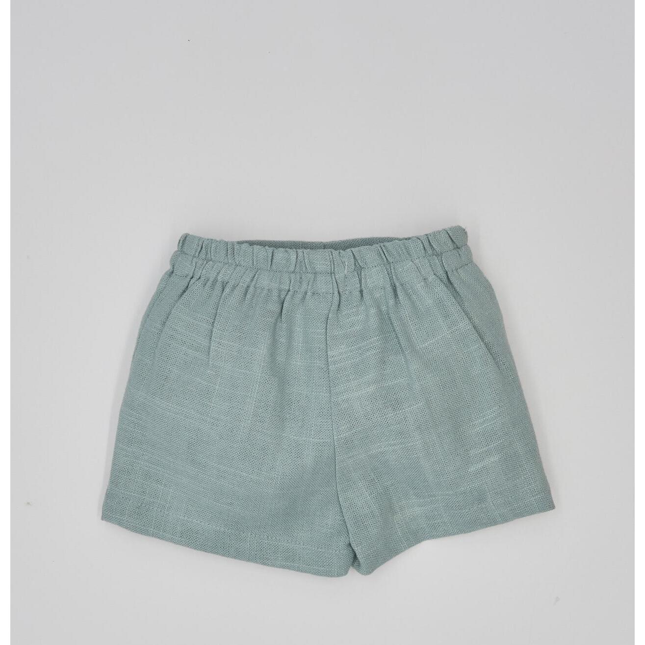 Bermuda lino agua. Con bolsillos falsos y botones, cintura elastica.