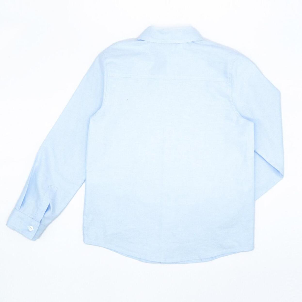 Camisa oxford azul de manga larga. Con cuello italiano.