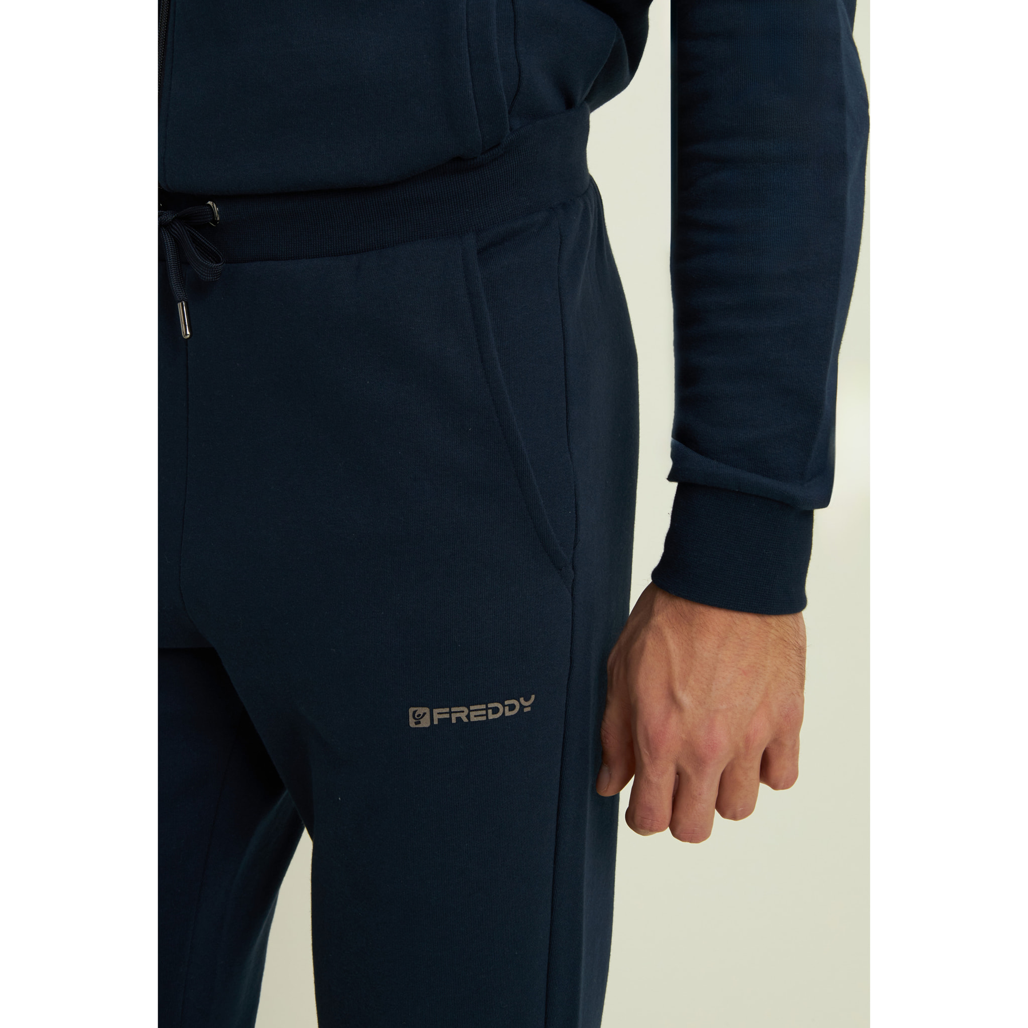 Pantaloni regular in felpa garzata con fondo in costina