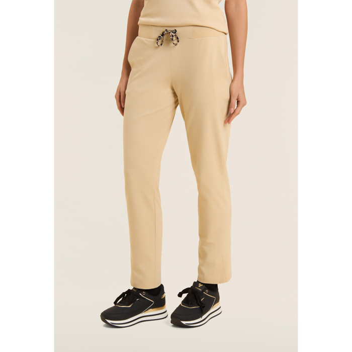 Pantaloni sportivi regular con spacchi laterali sul fondo