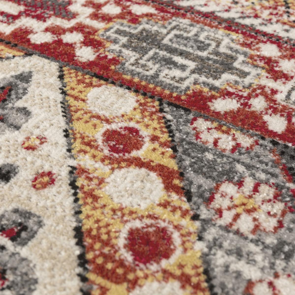 tapis fin aux motifs traditionnels Ethniques