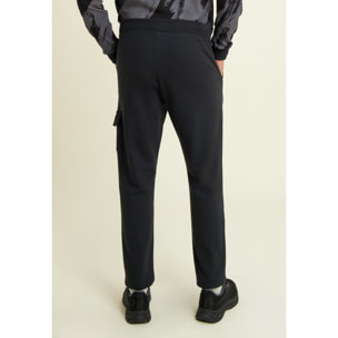 Pantaloni in felpa con tasca cargo e fondo a polsino