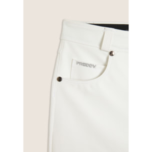 Pantaloni skinny in similpelle con logo ricamato