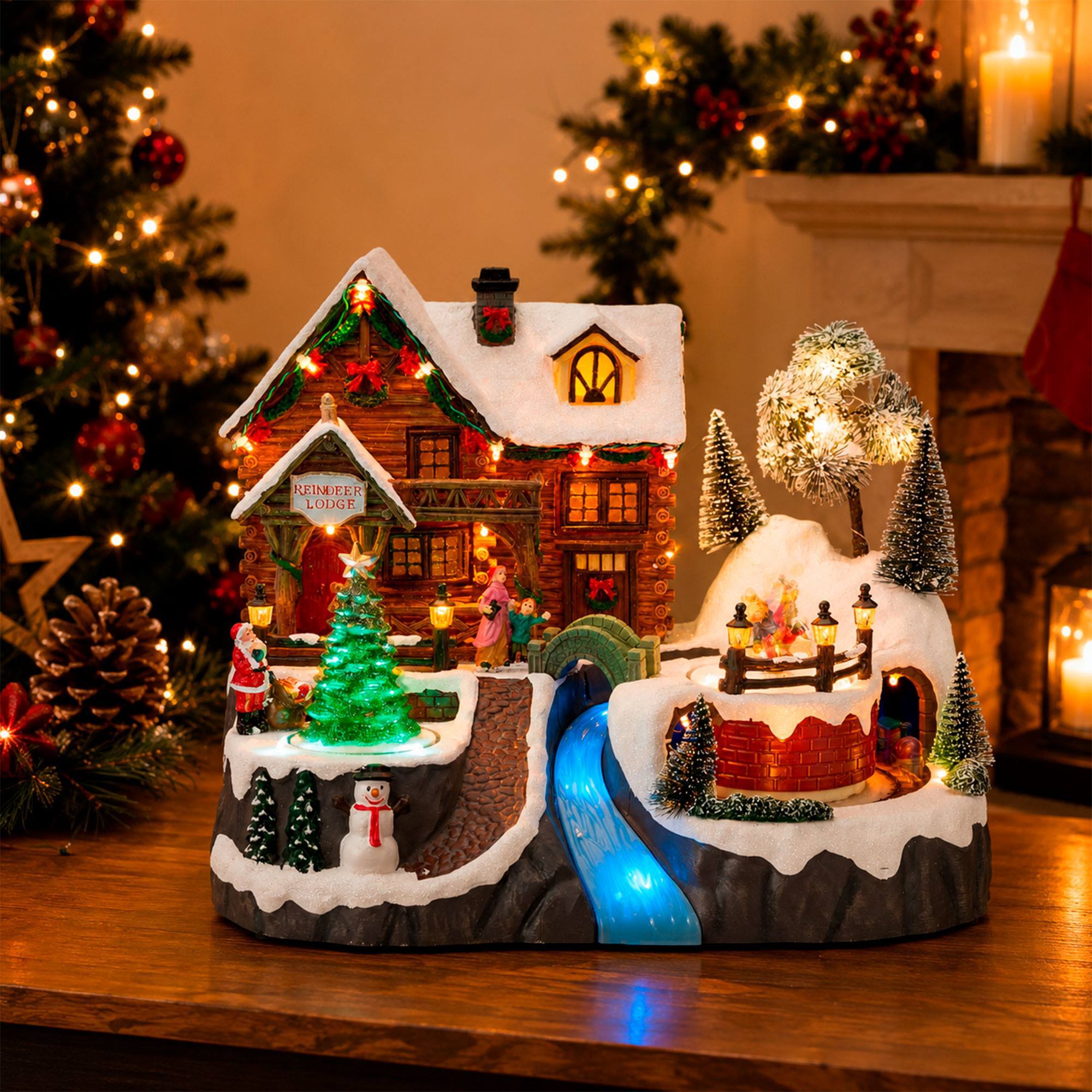 Pueblo navideño con tren, luces led, movimiento y música, usb o pilas 35x24,5x28,5 cm